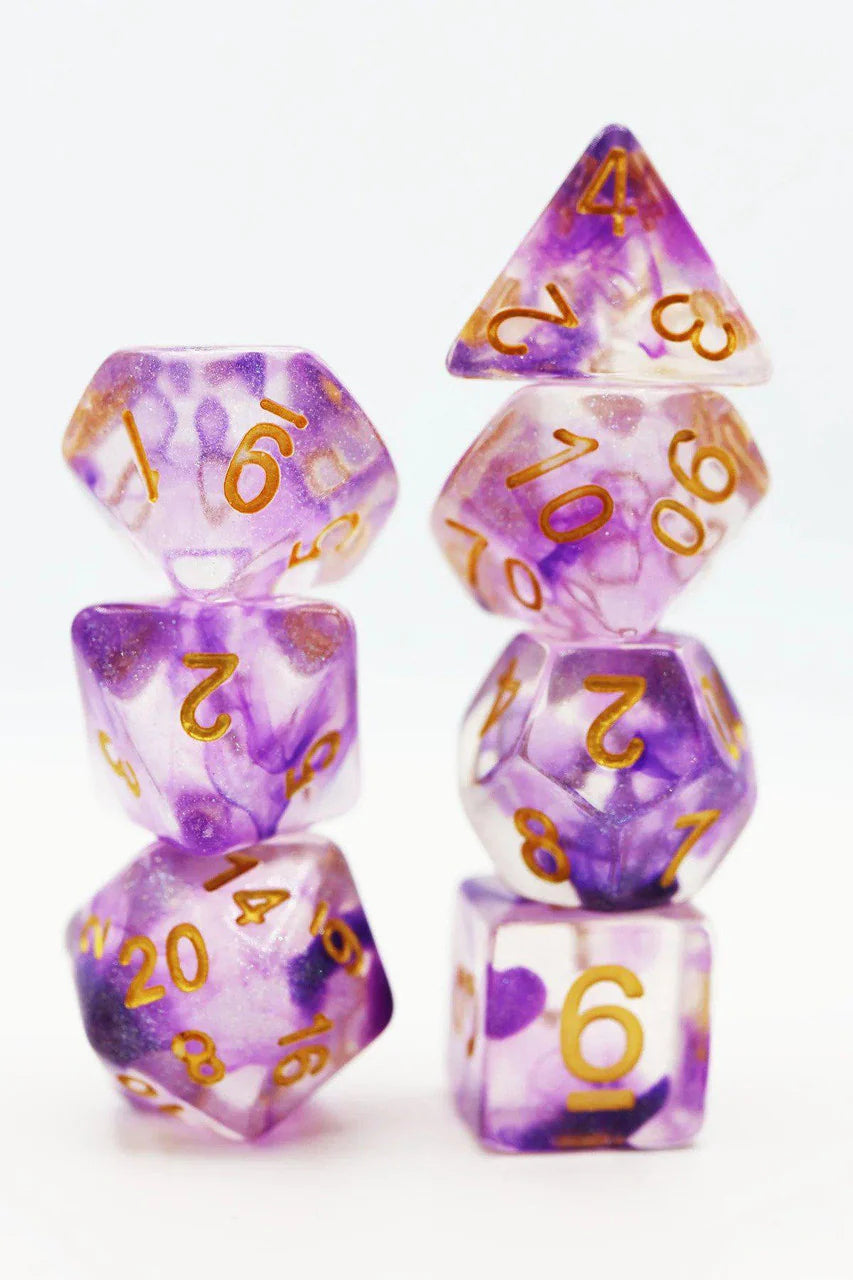 Electric Iris RPG Dice Set with translucent purple resin dice and gold numbers on a white background.