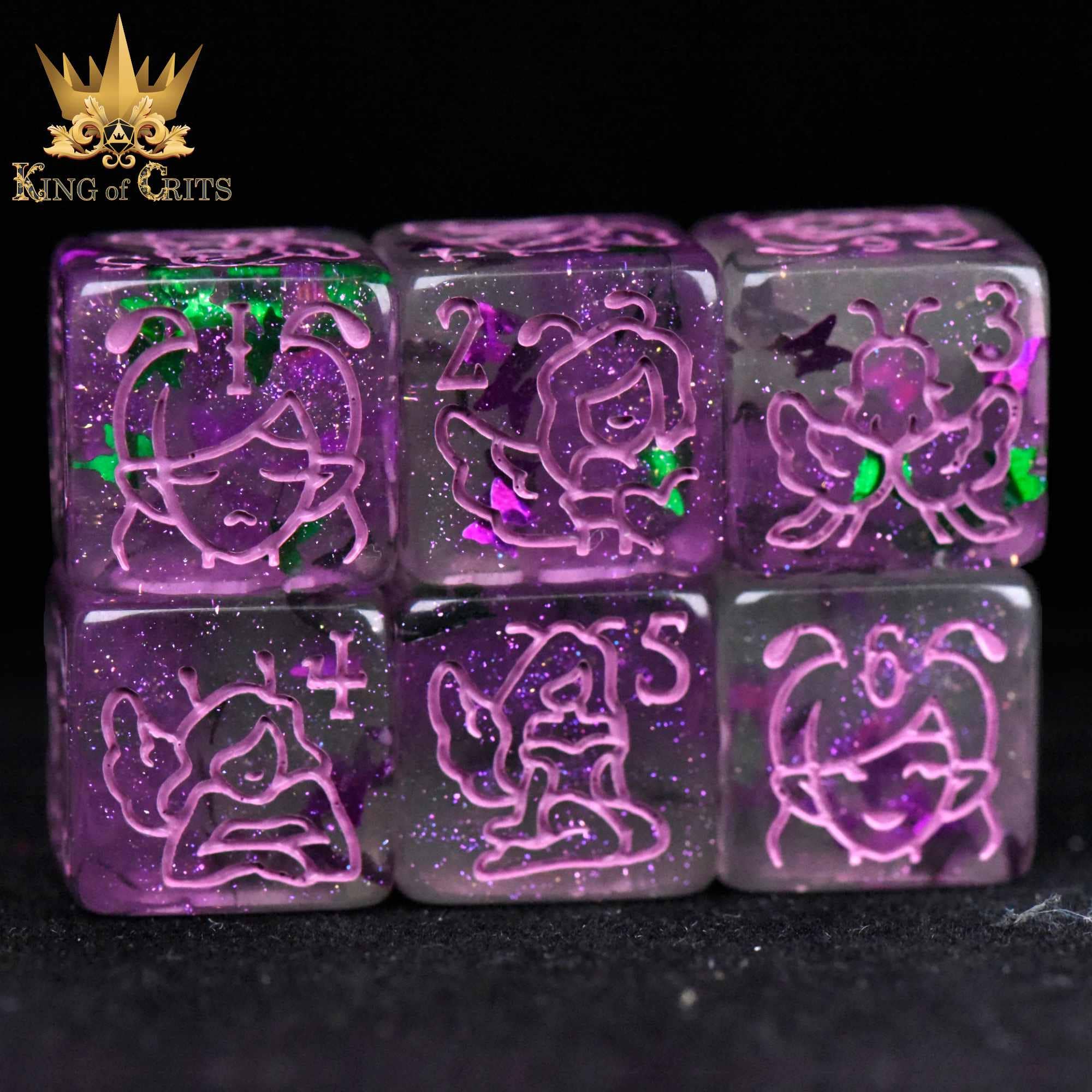 Set of eleven purple glitter dice with pink numbers, labeled King of Crits, Fairy Flight - 11 Dice Set.