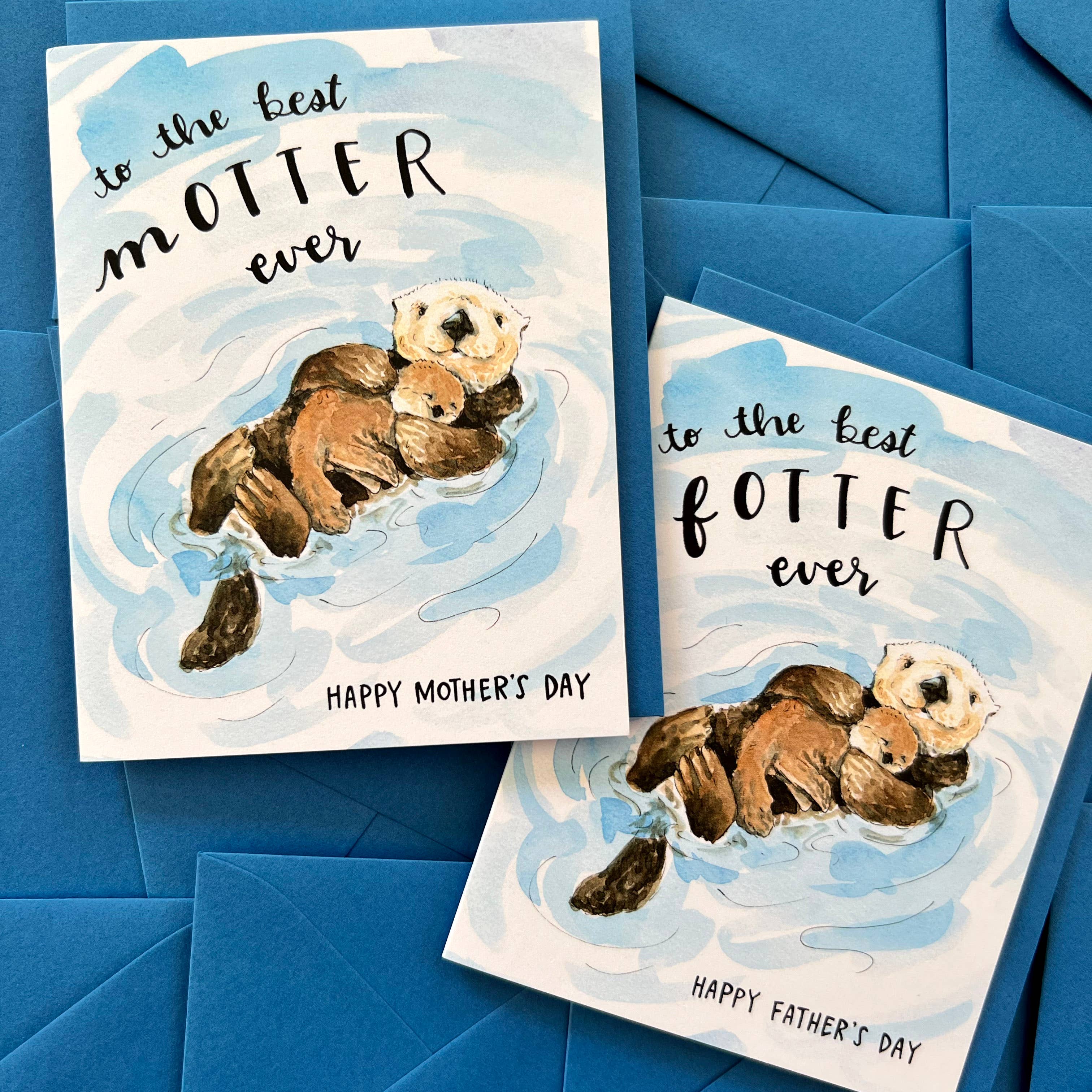 Watercolor greeting card with otters and the text To The Best Motter Ever for Mother’s Day.