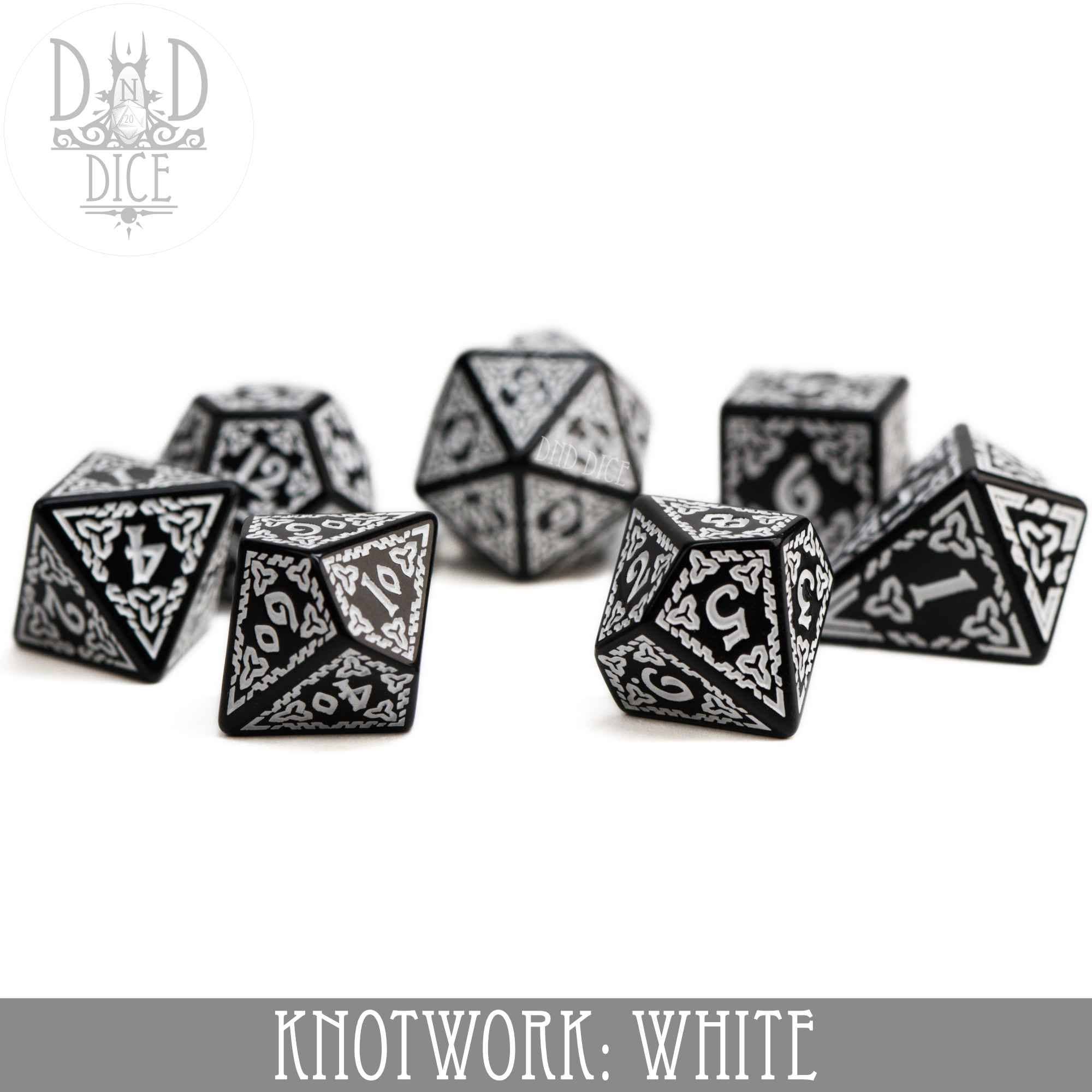Knotwork: White, set of seven black acrylic dice with white knotwork designs, including a teardrop D4.