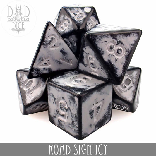 Black and white acrylic 7-dice set for tabletop games, stacked, labeled Road Sign Icy at the bottom.