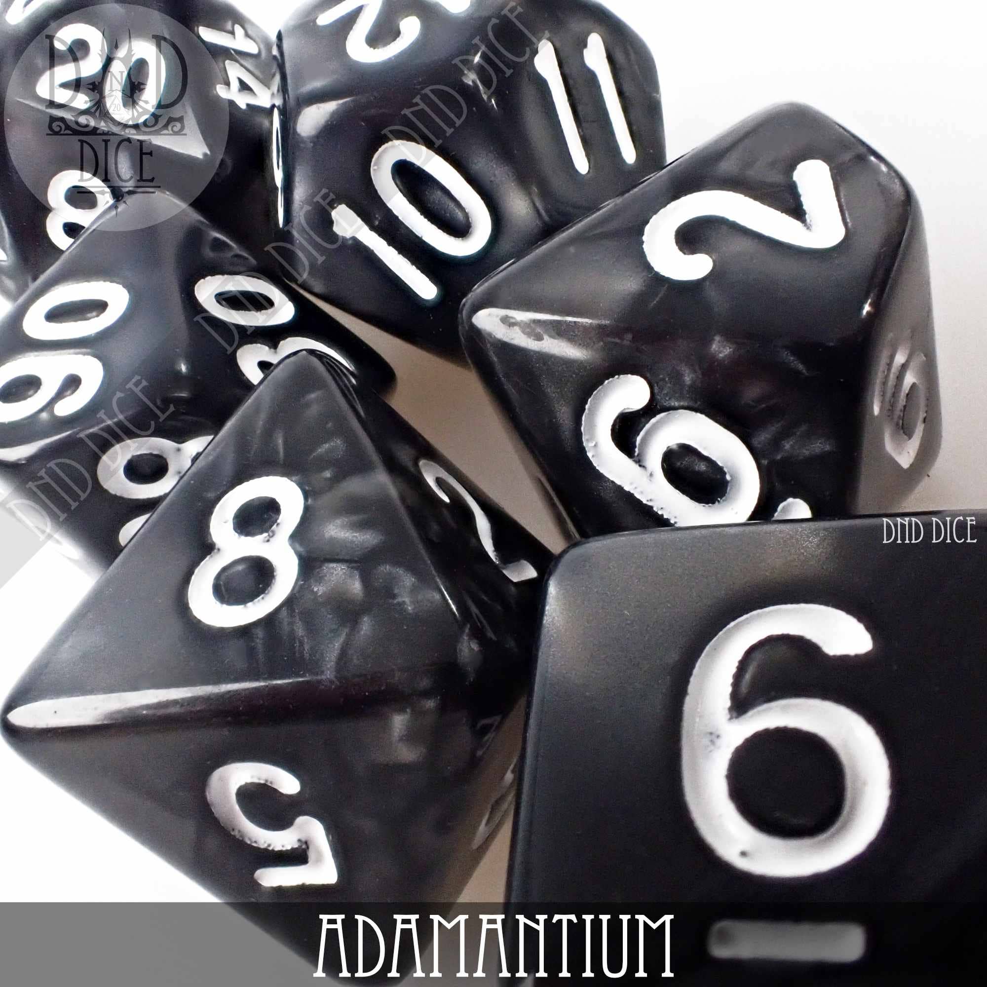 Black acrylic Adamantium dice set, 7 or 11 pieces, with white numbers.