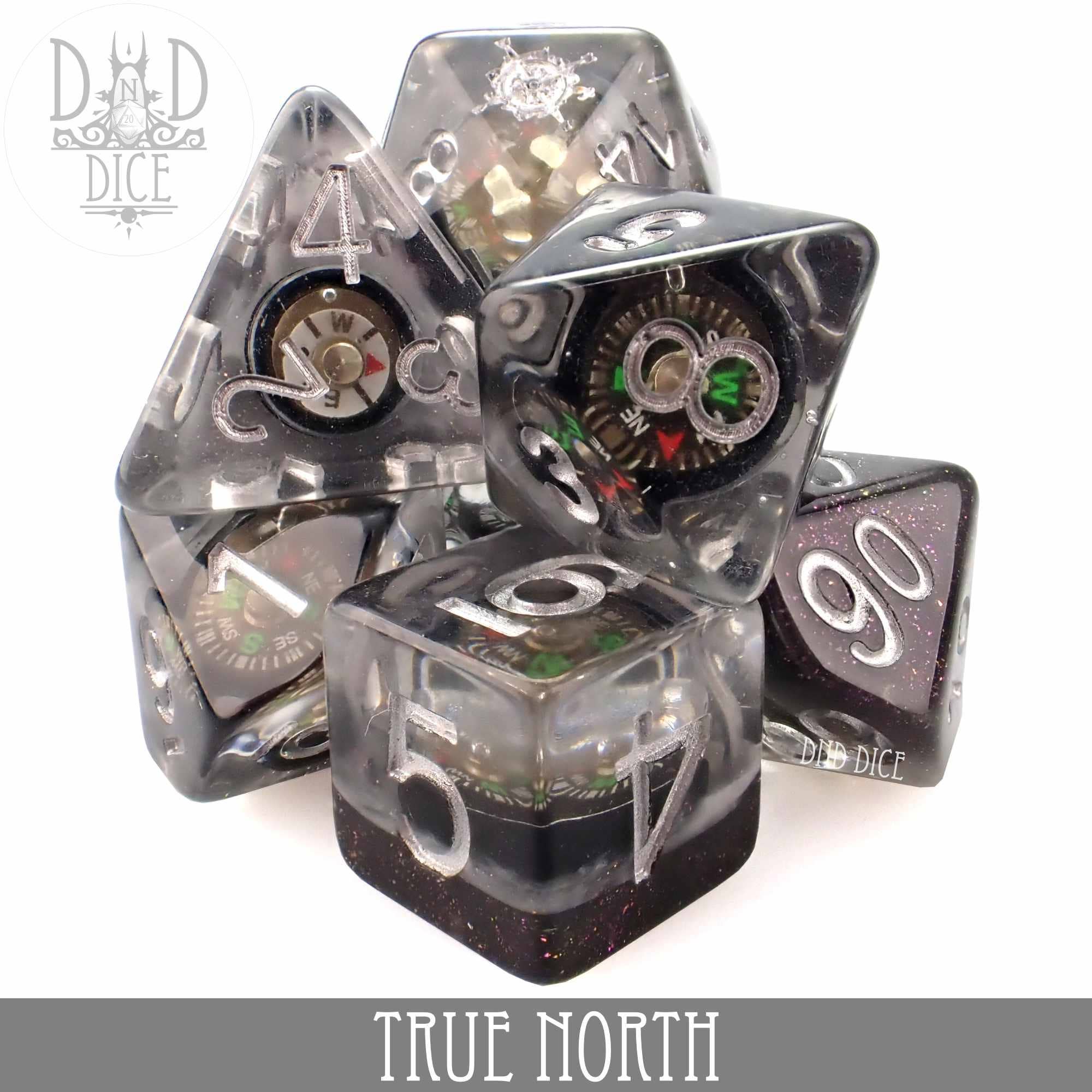 True North 7-dice translucent resin set with real compass, labeled DND Dice.