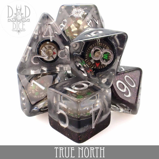 True North 7-dice translucent resin set with real compass, labeled DND Dice.