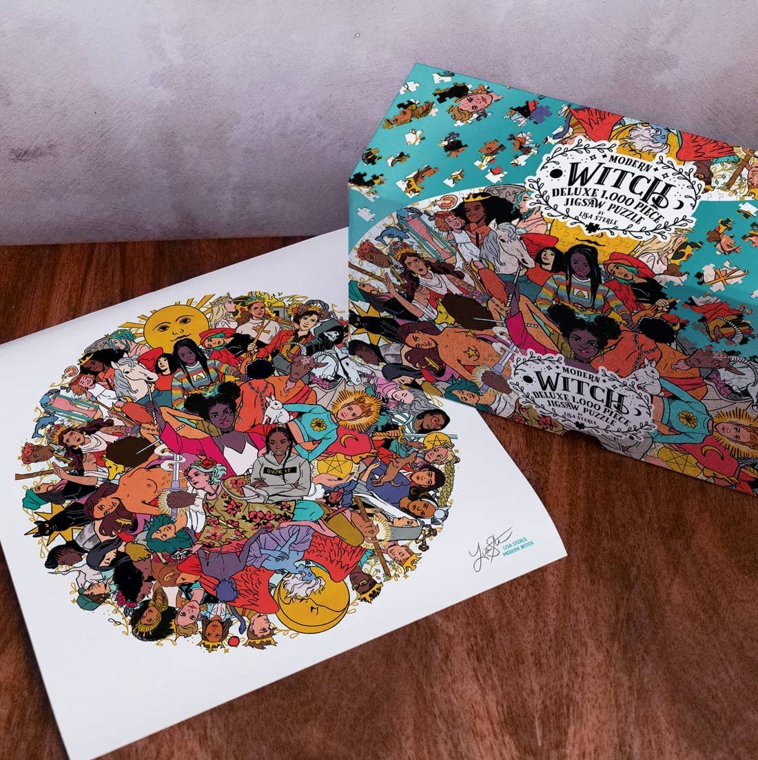 Modern Witch Deluxe 1,000 Piece Puzzle by Lisa Sterle featuring illustrated diverse witches in a circle.