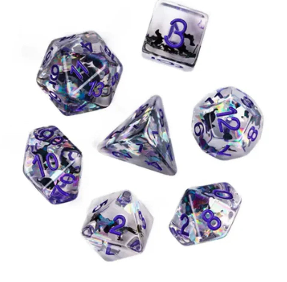 Cat Colony RPG Dice Set with clear resin polyhedral dice, purple numbers, and iridescent flakes.