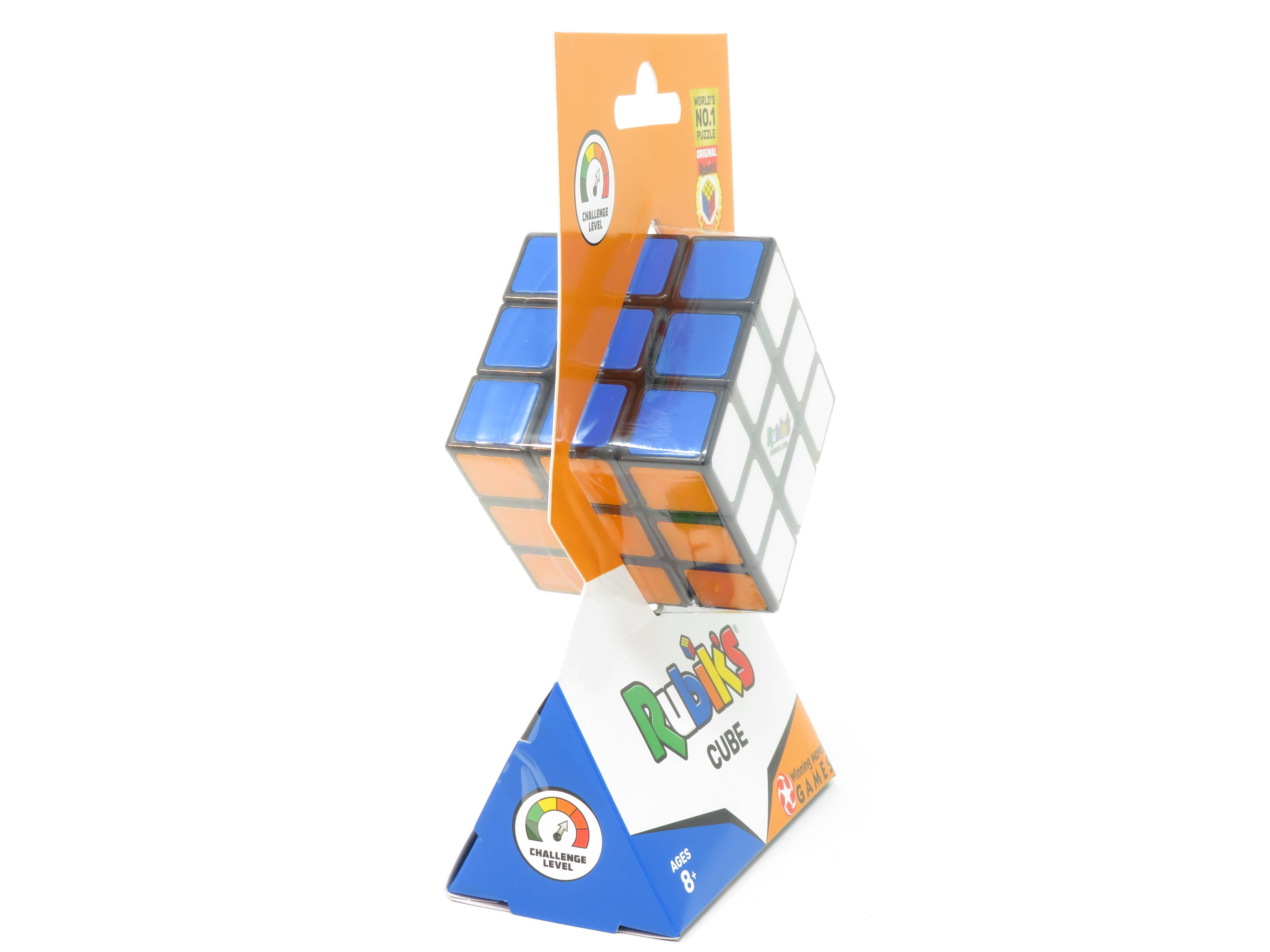 Rubiks Cube 3x3 in packaging with visible orange, blue, and white sides.