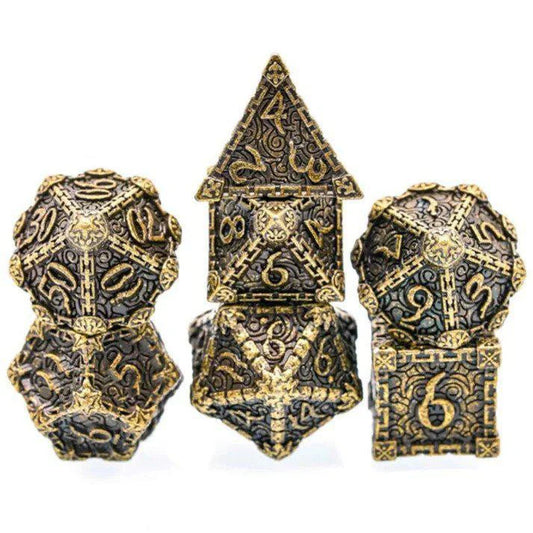 Three Dagger of Venom bronze 16mm RPG metal dice with intricate patterns, shown side by side.