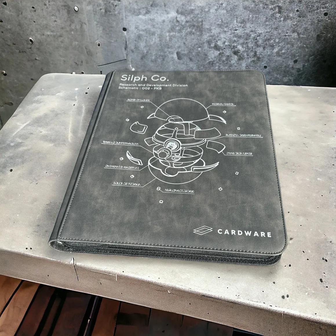 Gray 9-pocket Cardware Binder featuring Silph Co. custom art and logo.