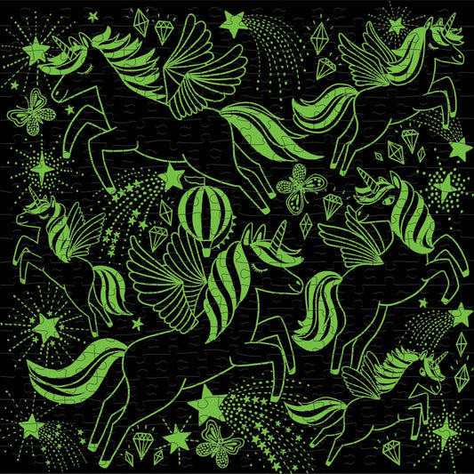 Unicorns Illuminated 300 Piece Puzzle featuring glowing unicorns, stars, and diamonds on a black background.
