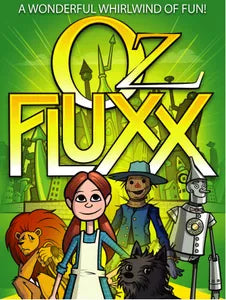 Oz Fluxx game cover featuring Dorothy, Toto, Scarecrow, Tin Man, and Lion in front of Emerald City on green background.