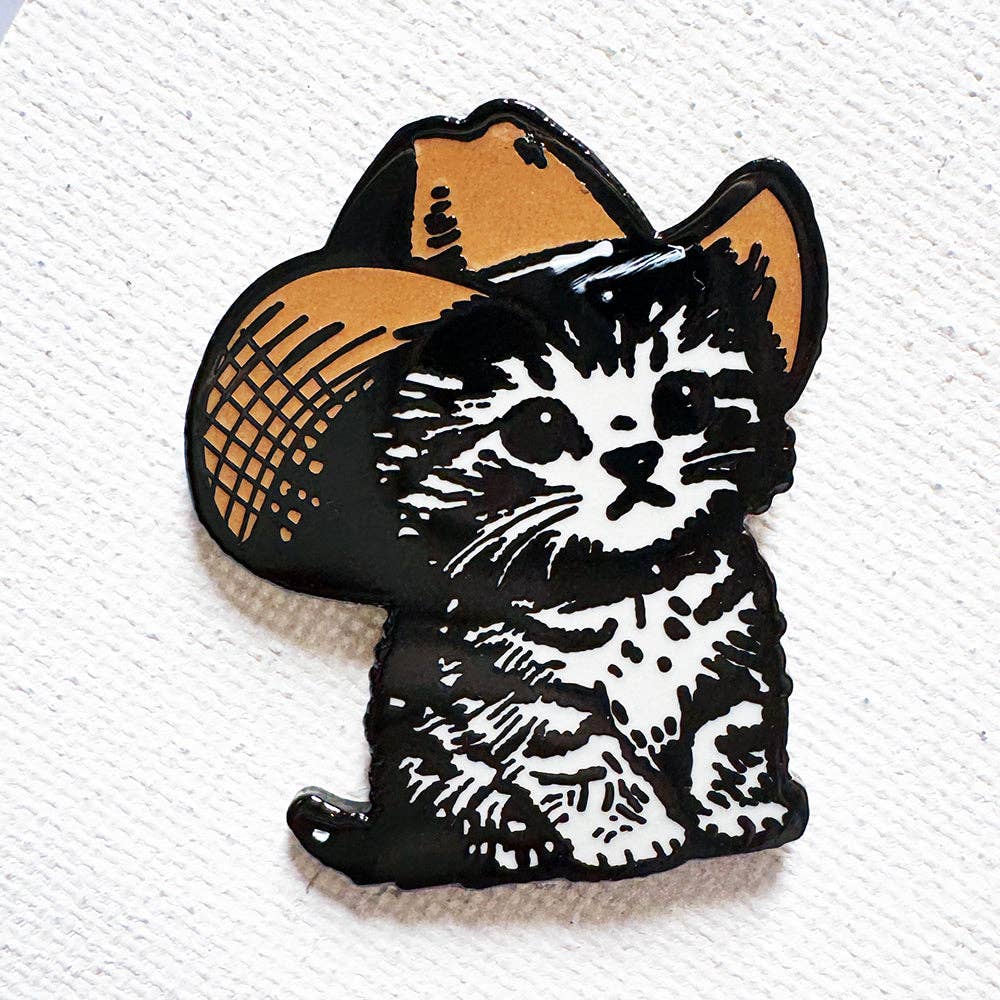 Howdy Kitty pin: black and white kitten wearing a brown cowboy hat with a butterfly clasp.