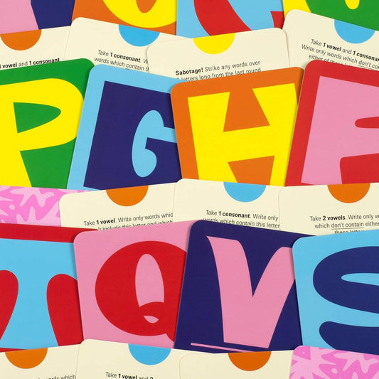 Alphabuzzle colorful cards featuring bold letters for playing a family word game.