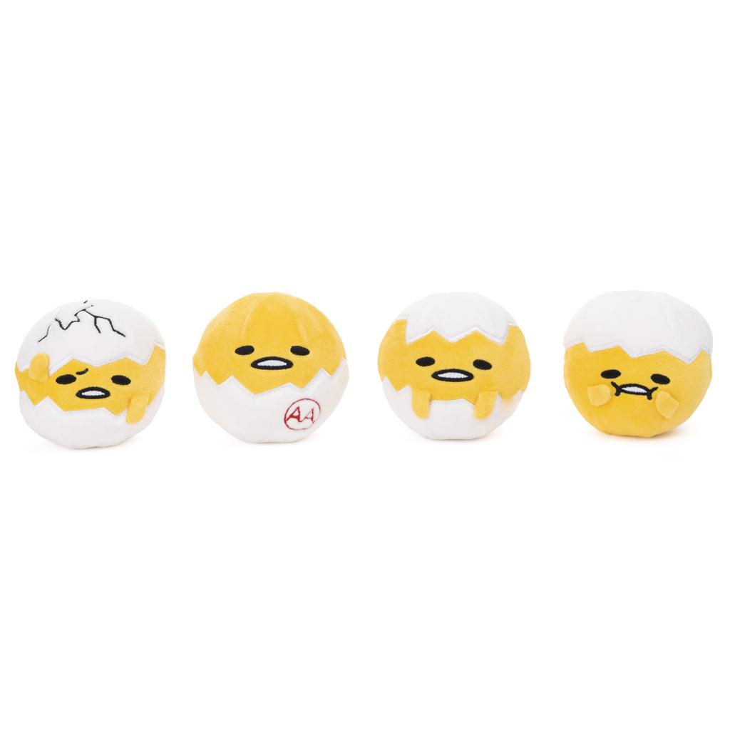 Set of four 3.5-inch Gudetama round squishy toys with eggshell designs and facial expressions.