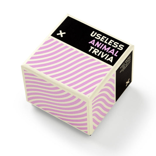Brass Monkey Useless Animal Trivia box and animal facts trivia cards. Box has black, white, pink wavy lines.