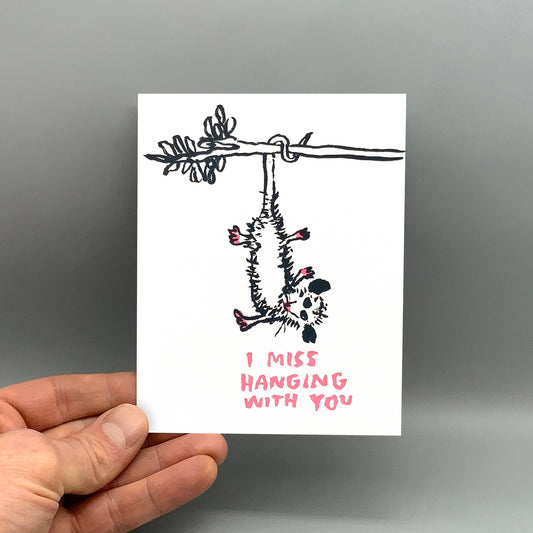 Letterpress card with creature on branch and text I MISS HANGING WITH YOU. Made in Portland, Oregon.