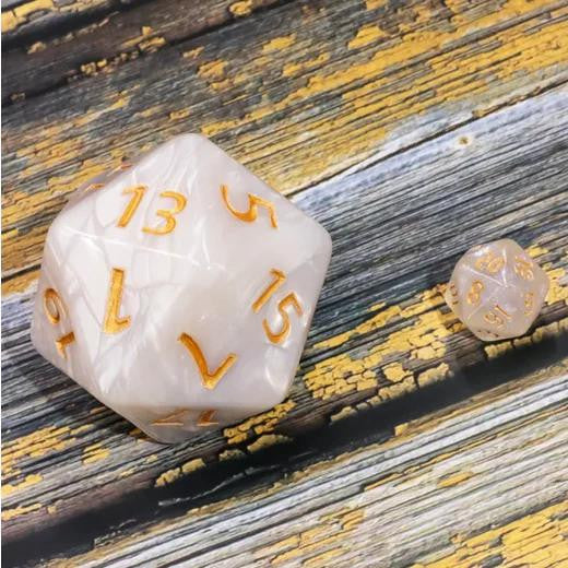 55mm Titan D20 White Pearl die and small white pearl die with gold numbers.