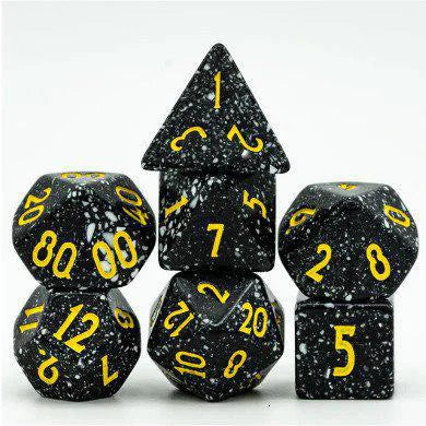 Deep Space RPG Dice Set with seven black speckled dice featuring yellow numbers.