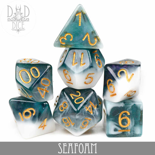 Seafoam Dice Set with blue-green and white polyhedral dice, each numbered in gold.