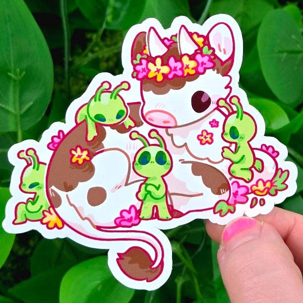 Waterproof sticker set featuring a cartoon cow with a flower crown and cartoon aliens.