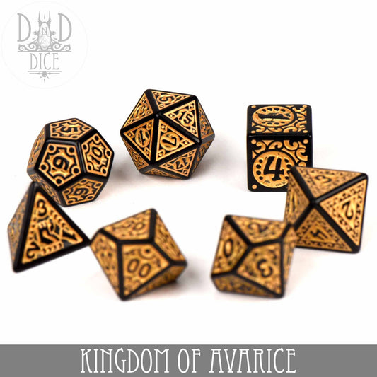 Set of seven gold and black acrylic dice from the Kingdom of Avarice collection for tabletop gaming.