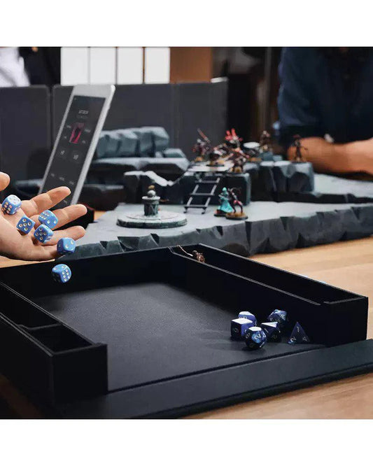 Dragon Shield RPG: Player Companion Iron Grey dice tray with blue dice being rolled during a tabletop RPG session.