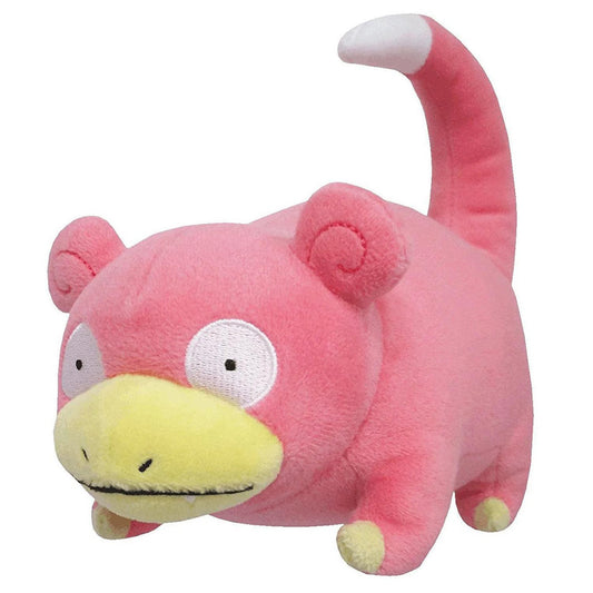 Slowpoke plush toy, pink with a yellow snout and raised tail, representing the Water-type Pokémon.