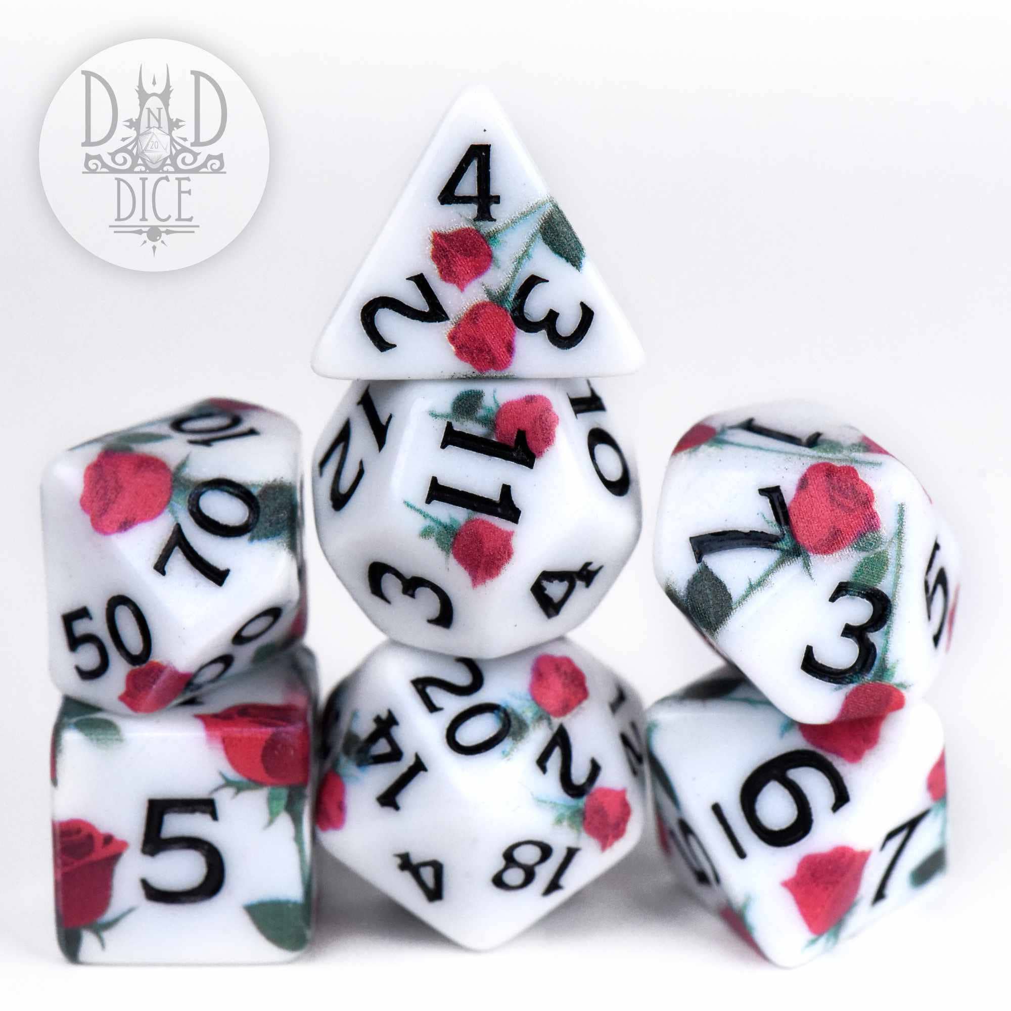Rose Doodles: White acrylic DND dice with red rose patterns and black numbers.