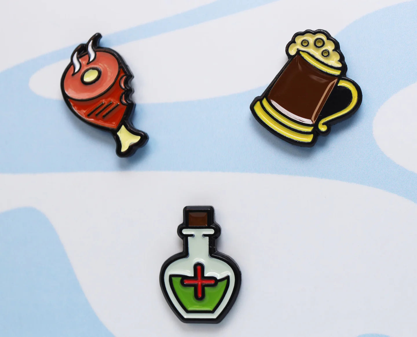Mini Pins: Provisions Pack with meat leg pin, frothy beer mug pin, and potion bottle pin.
