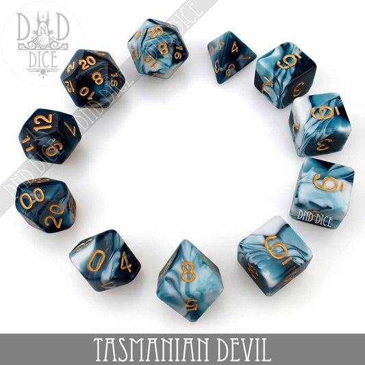 Tasmanian Devil 7 or 11 marbled blue and white polyhedral dice set with gold numbers.