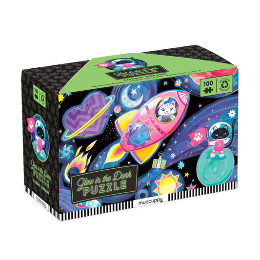 Cosmic Dreams 100 Piece Glow in the Dark Puzzle featuring cats, rockets, planets, and stars in a space scene.