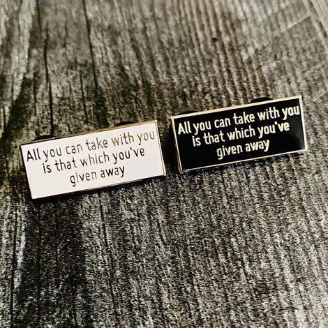 Two All You Can Take with You lapel pins inspired by It’s a Wonderful Life.