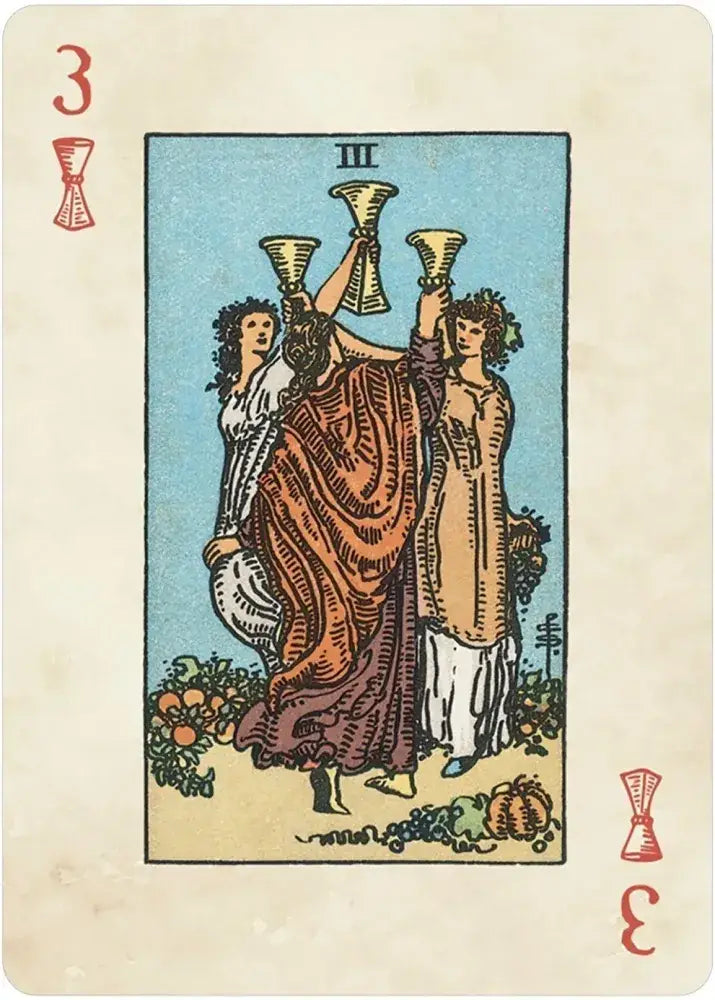 Three women in flowing dresses toast, a classic scene from the Rider-Waite™ Playing Card Deck.