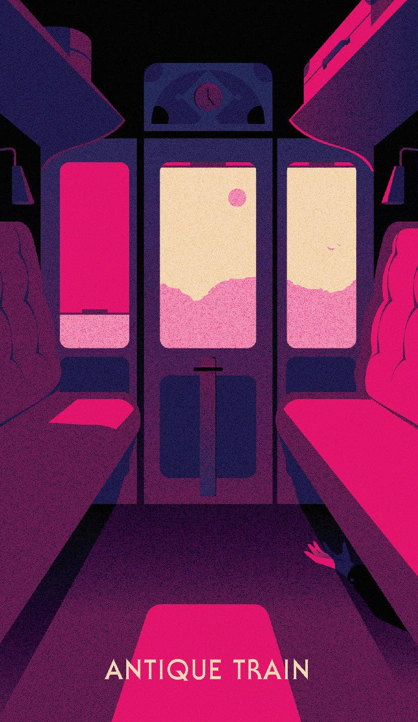 Murdle Oracle Deck card held in a hand above empty pink seats inside a vintage train at sunset.