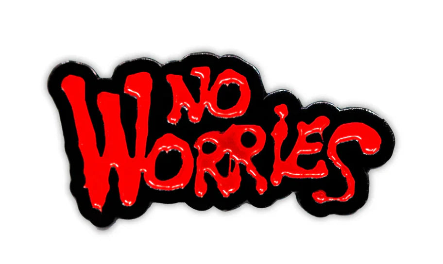No Worries pin with red text and black outline on a white background.