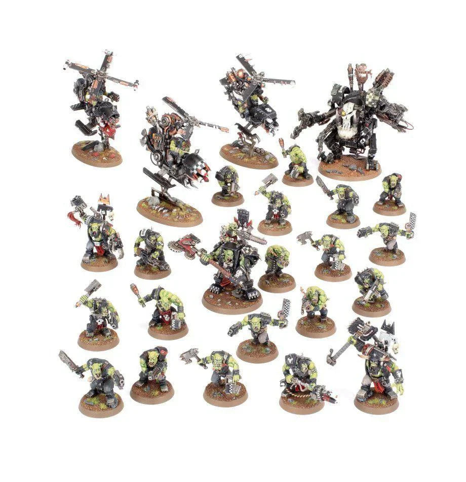 Combat Patrol: Orks miniatures with weapons on round bases.