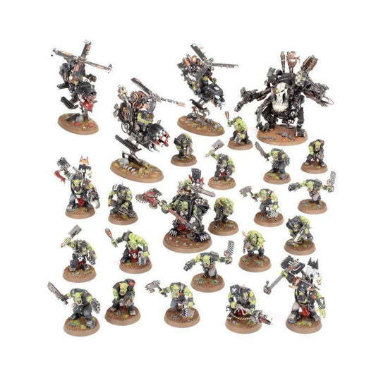 Combat Patrol: Orks miniatures with weapons on round bases.