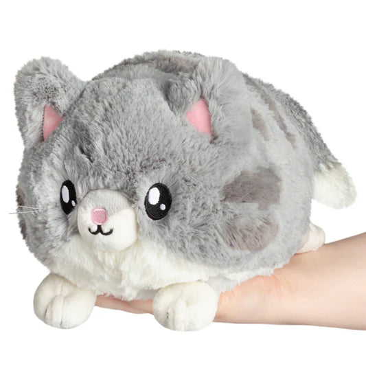 Mini Squishable Grey Kitty plush, gray and white with big eyes, sized to fit in a hand.