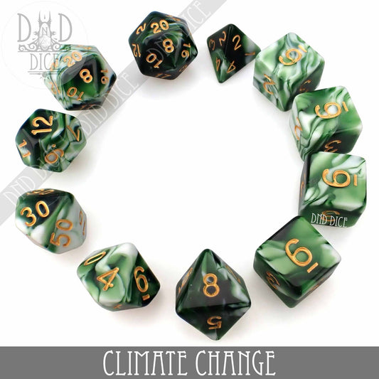 Green and white marbled acrylic dice with gold numbers arranged in a circle; text reads Climate Change 7 or 11.