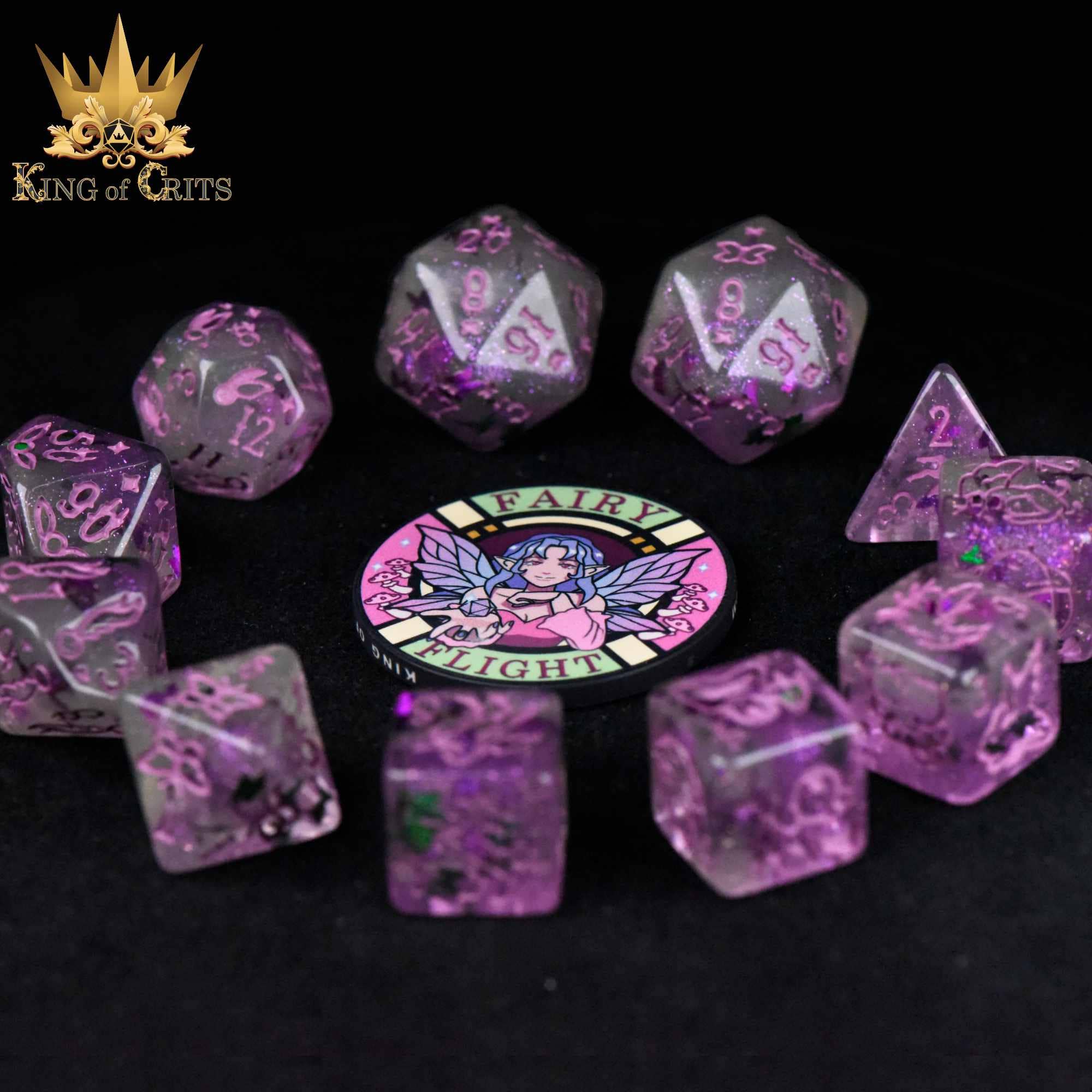 The Fairy Flight - 11 Dice Set with purple, glittery dice and pink numbers, arranged around a DND ceramic poker chip.