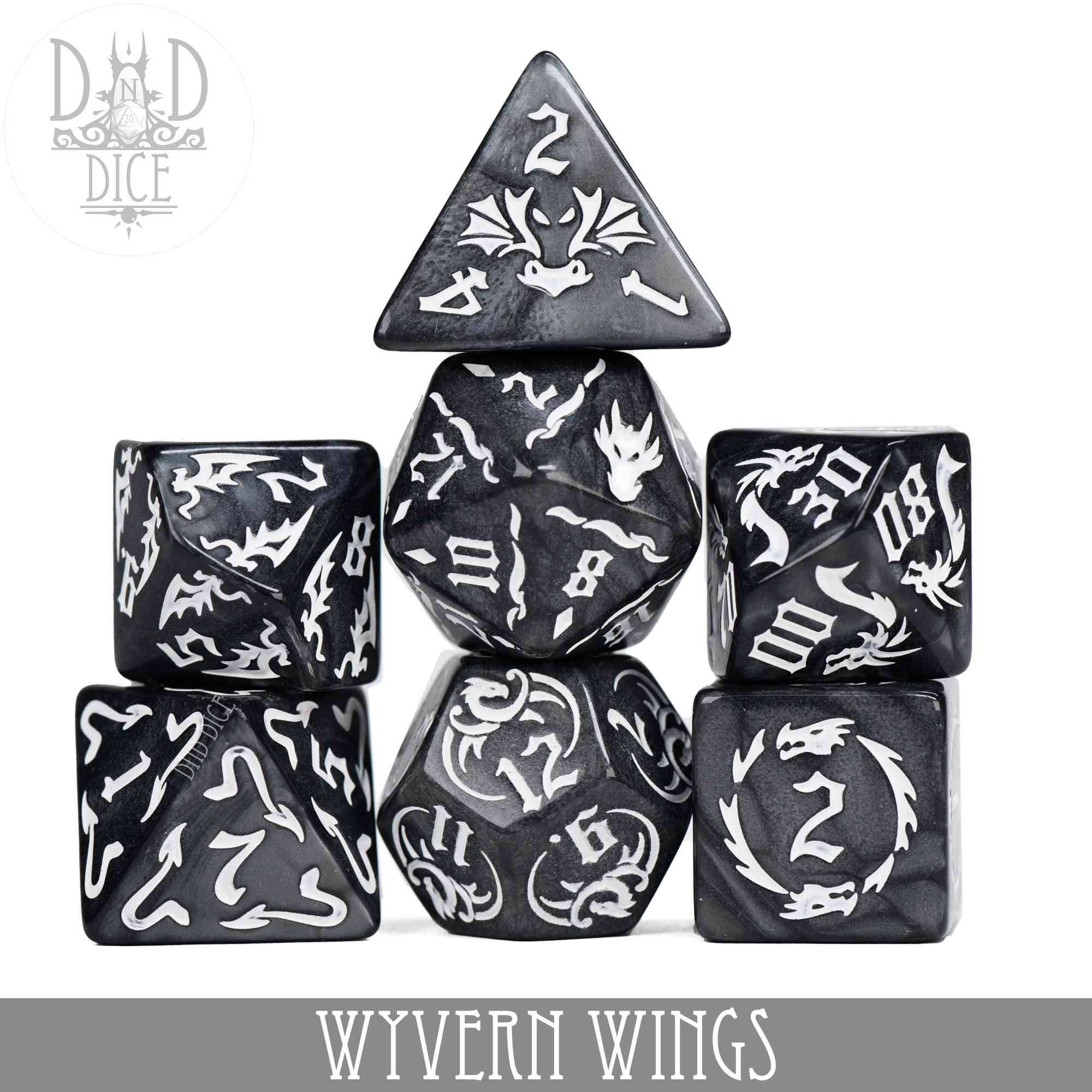 Black and white polyhedral dice set with wyvern designs, Wyvern Wings variant.
