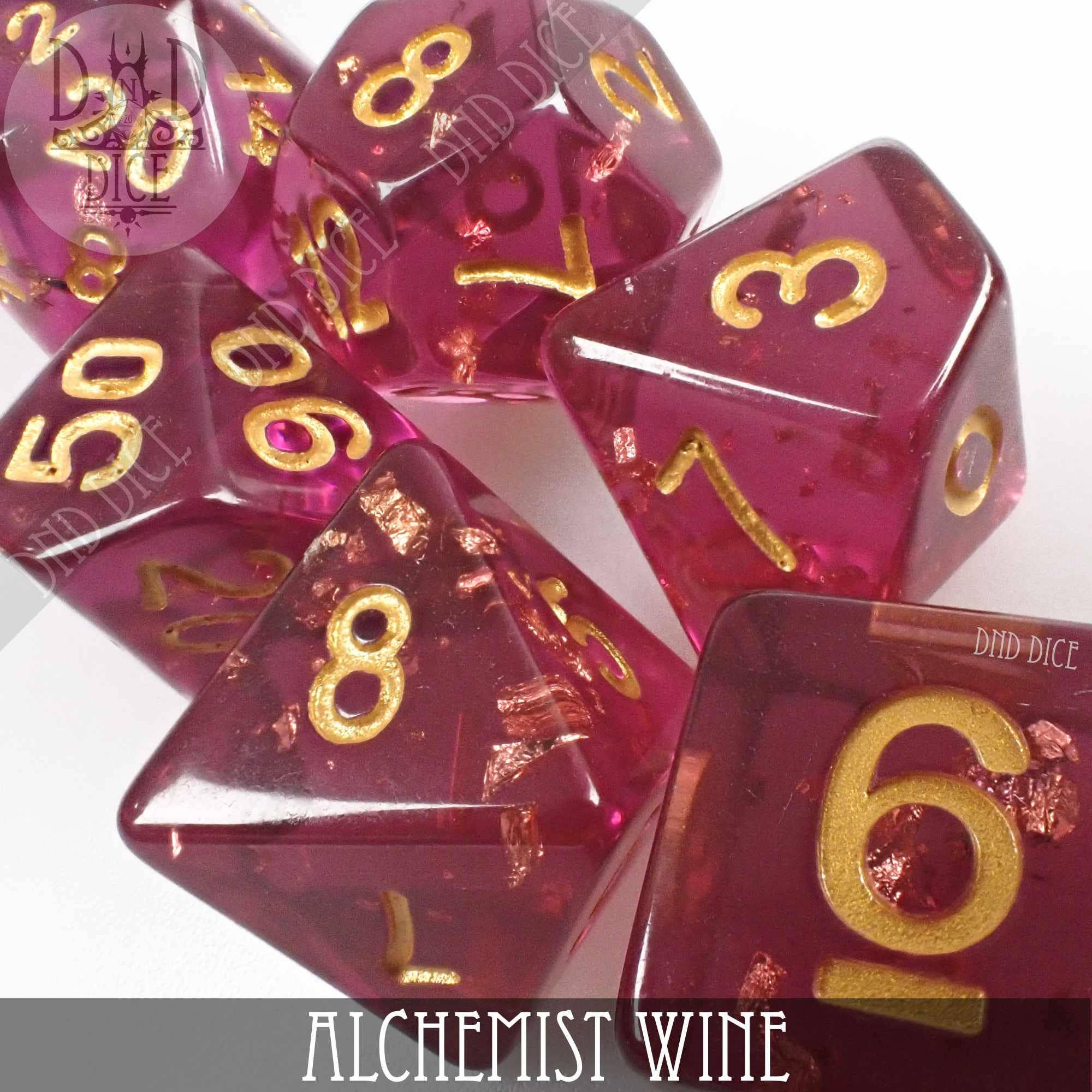 Alchemist Wine: Set of seven translucent magenta resin dice with gold numbers and copper flakes for tabletop gaming.