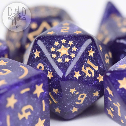 Twinkle Little Star resin DND dice set featuring a purple d20 with gold numbers and star designs.