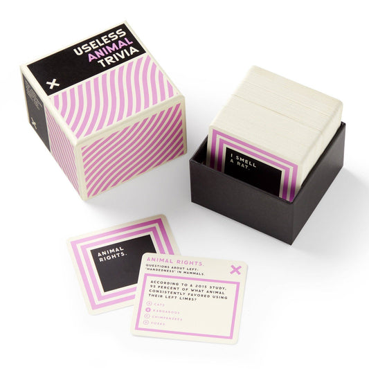 Brass Monkey Useless Animal Trivia box and stack of cards featuring unusual animal facts, including rat trivia.