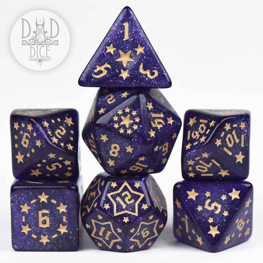 Twinkle Little Star 7-piece purple glitter resin DND dice set with gold numbers and star designs.
