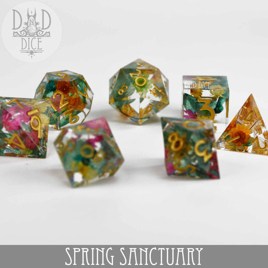 Spring Sanctuary handmade 7-piece polyhedral resin dice set with colorful floral designs for tabletop games.