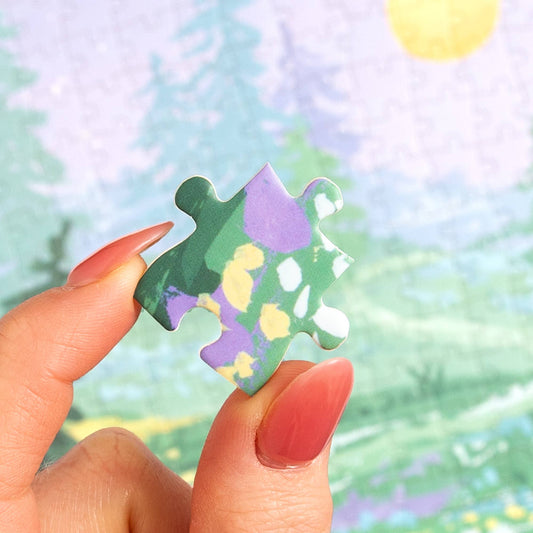 Hand holding a piece from the Twilight Garden - 500 Piece Jigsaw Puzzle.