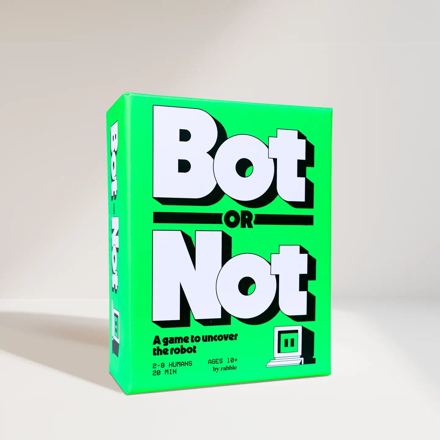 Upright Bot or Not game box, bright green with bold text and a small computer icon.