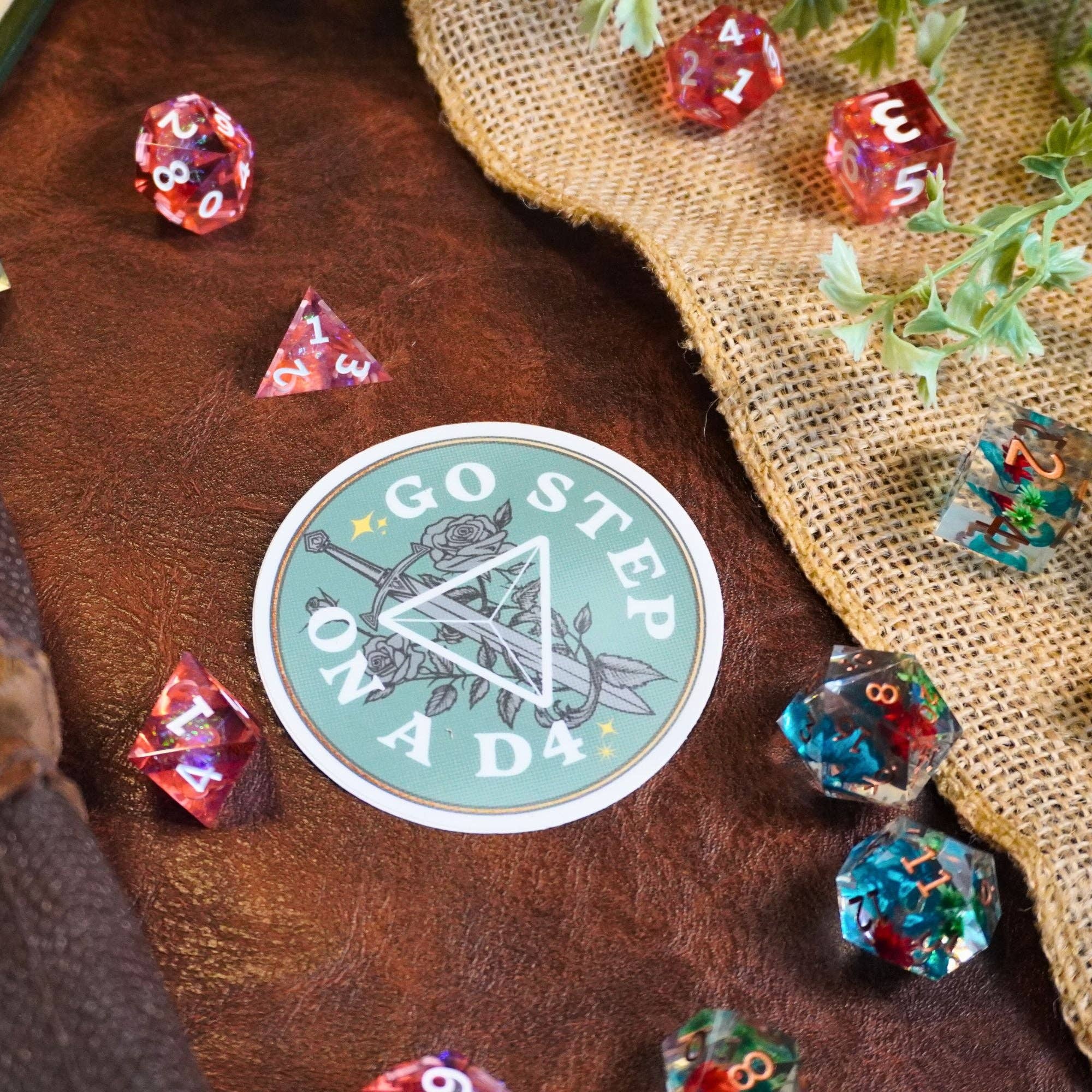 Go Step on a D4 sticker featuring a colorful polyhedral dice design.