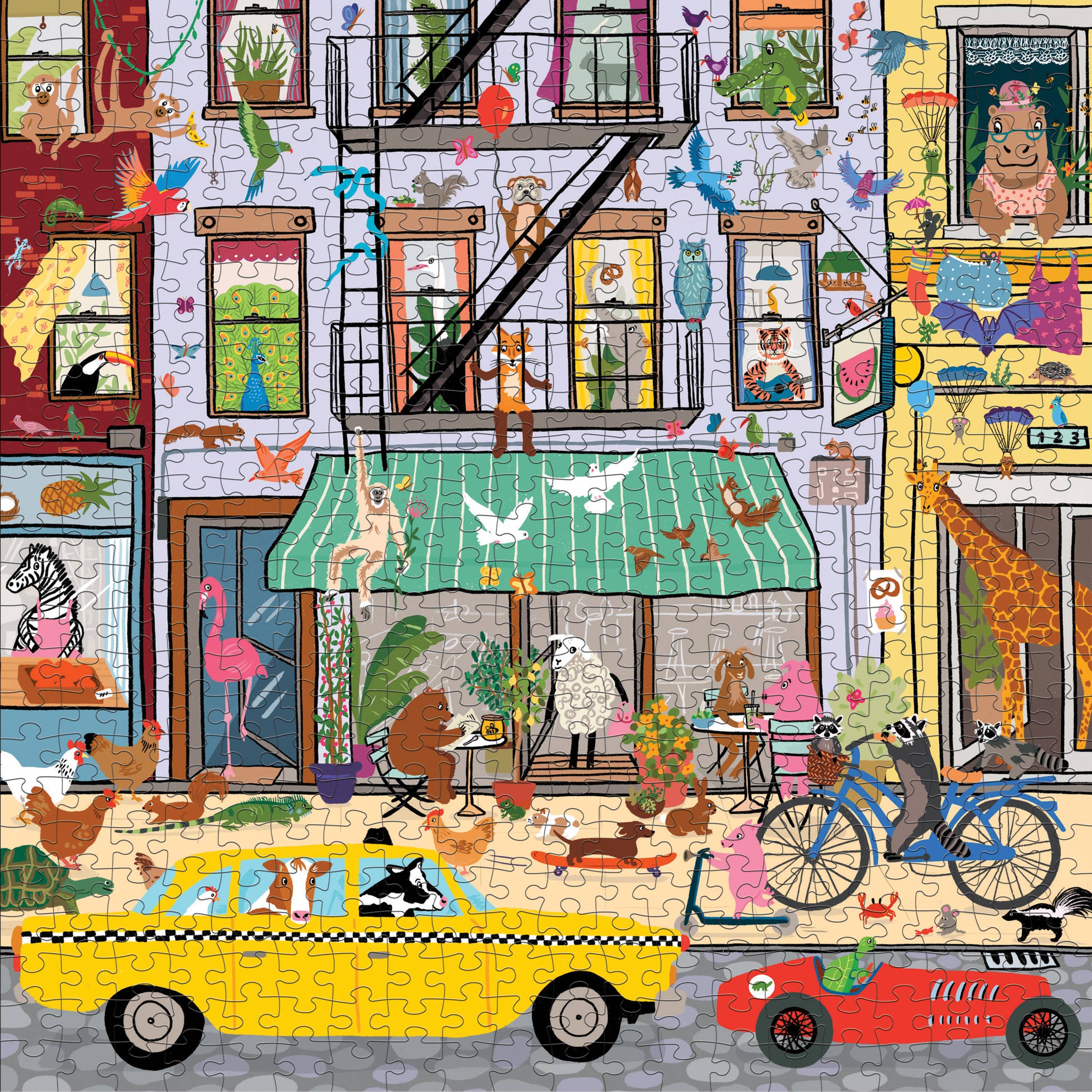 Critter City 500 Piece Family Puzzle featuring animals, bicycles, a taxi, and a red car near buildings.